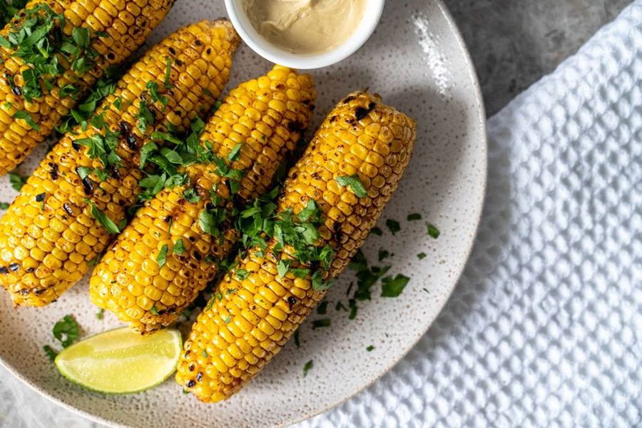 recipe image Smokey Char-Grilled Corn Cobs with Maple Butter